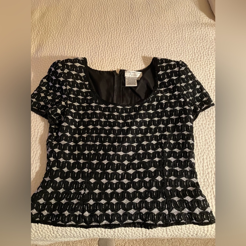Beaded black and silver top.